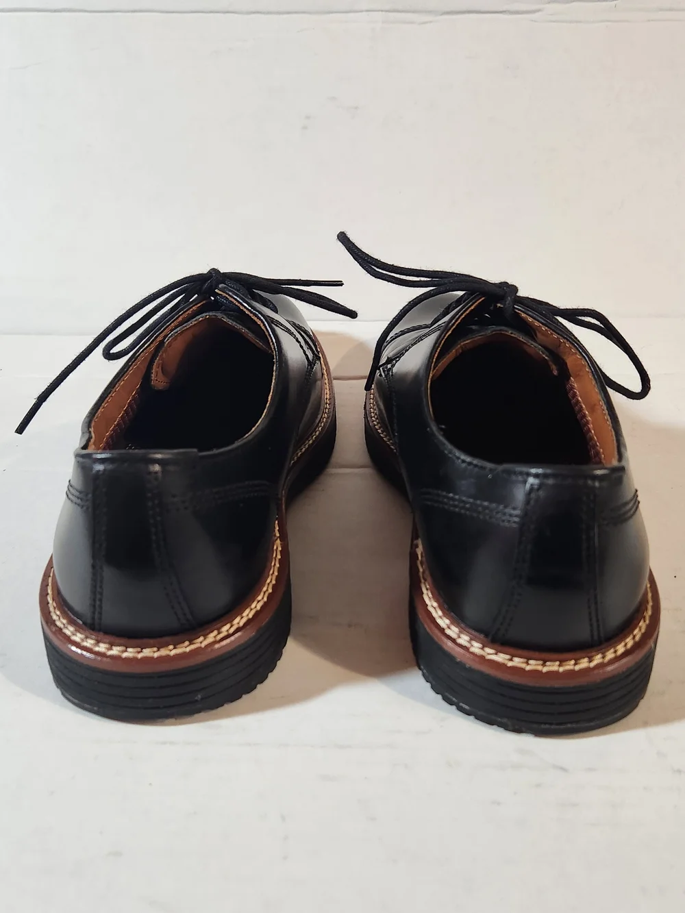 Johnston & Murphy Black Leather Cap-Toe Derby with Brown Welt